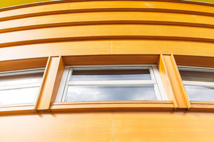 House exterior finished with wood siding panels